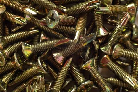 Construction, repair, tools - Self-tapping screw background Stock Photos