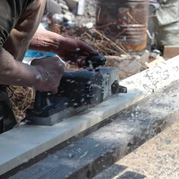 Construction, repair, tools - Work on the Hand plane Stock Photos
