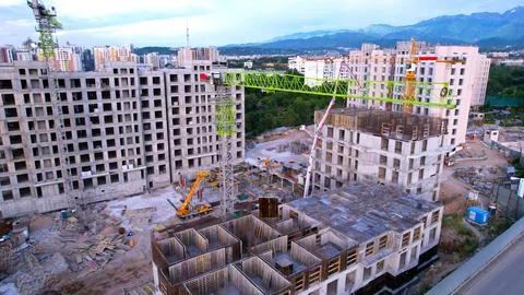 Construction of a residential complex with cranes Stock Photos