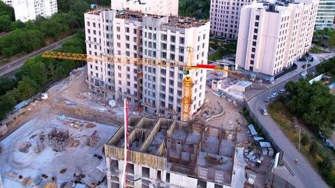 Construction of a residential complex with cranes Stock Photos