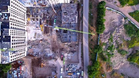 Construction of a residential complex with cranes, top view Stock Photos