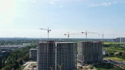 Construction of a residential complex. Work of tower cranes. Aerial view. Stock Footage 148887203