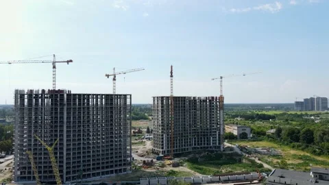 Construction of a residential complex. Work of tower cranes. Drone Aerial view. Stock Footage 167088567
