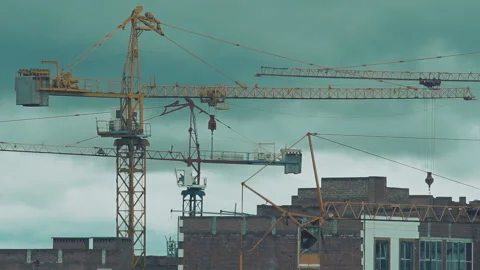 Construction of residential houses with several cranes. Time lapse Stock Footage 200732753