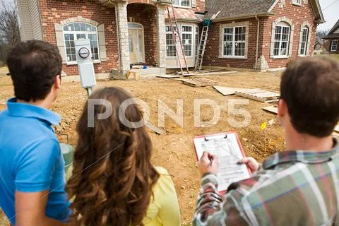 Construction: reviewing home checklist Stock Photos