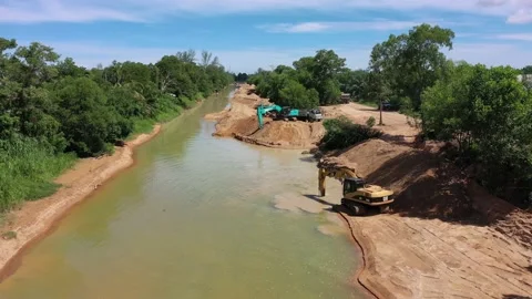 Construction on river bank Stock Footage 131696091