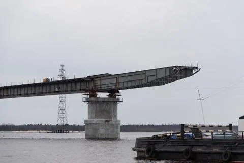 The construction of a road bridge over the river. Reinforced concrete piles 스톡 사진
