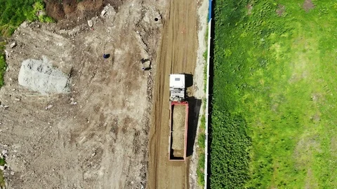 Construction of the road. Dump truck movement. Stock Footage 111529236