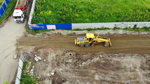 Construction of the road from a height. The movement of machinery. Stock Footage 111527747