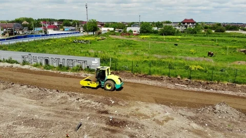 Construction of the road from a height. Work asphalt paver. Stock Footage 111528168