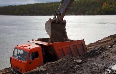 Construction of the road by the lake Stock Photos