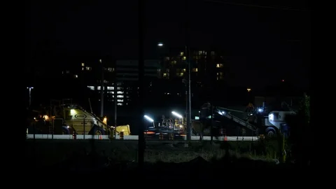 Construction road paving Time-lapse night time 動画素材 108604665