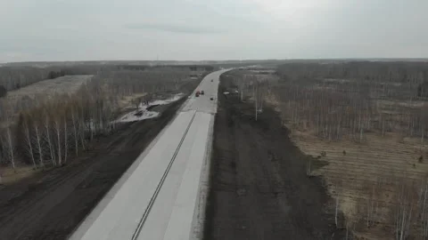 Construction of roads. Aerial drone view Vídeo Stock 322633094
