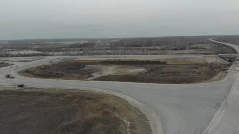 Construction of roads. Aerial drone view Vídeo Stock 322635000
