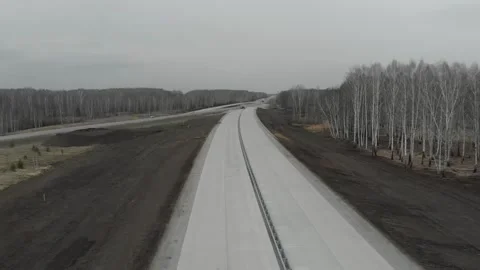 Construction of roads. Aerial drone view Vídeo Stock 322635130