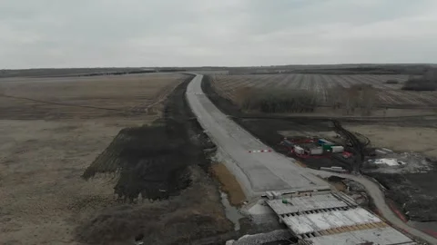 Construction of roads. Aerial drone view Vídeo Stock 322635476