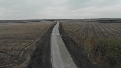 Construction of roads. Aerial drone view Vídeo Stock 322635567