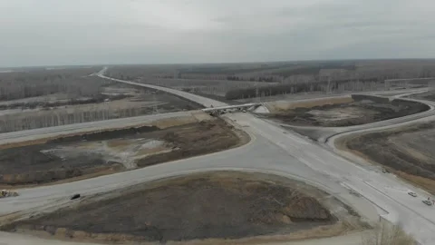 Construction of roads. Aerial drone view Vídeo Stock 322635624