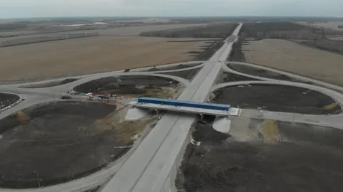 Construction of roads. Aerial drone view Vídeo Stock 322635782