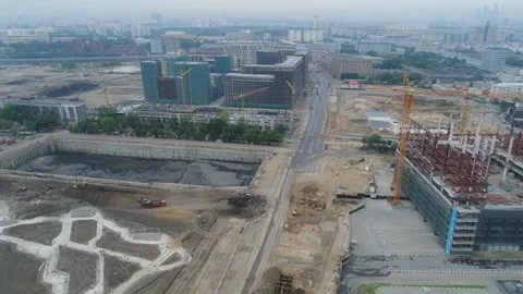 Construction of roads and buildings on the territory of the former factory. Stock Footage 100883057