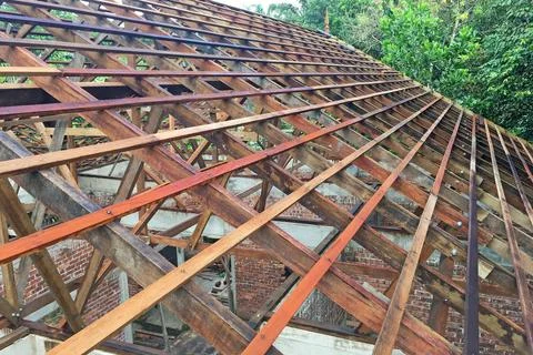 Construction of roof top frame using wood. Stock Photos