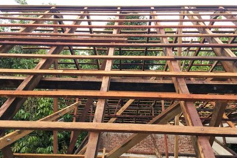 Construction of roof top frame using wood. Stock Photos