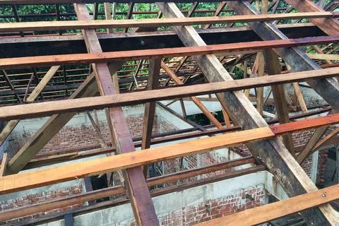 Construction of roof top frame using wood. Stock Photos