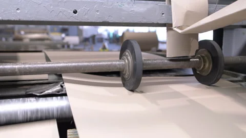 Construction with round parts creates flat cardboard surface Stock Footage 303104823