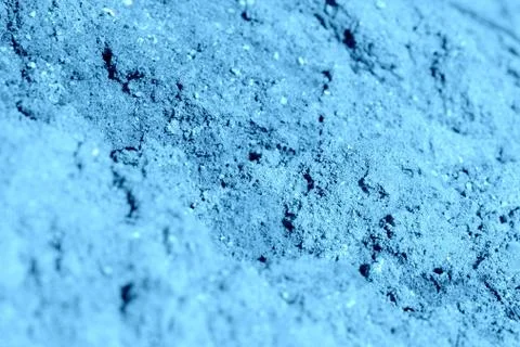 Construction sand texture close-up. Natural abstract background blue color Stock Photos
