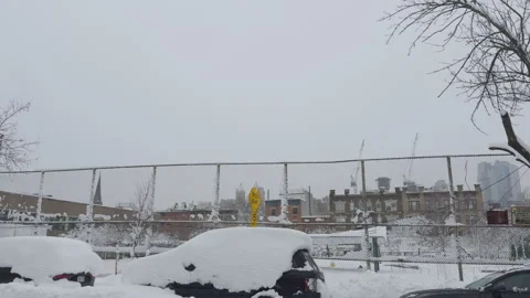 Construction Scaffolding and Cranes Under Snow, Brooklyn, Winter Blizzard Video stock 329689111