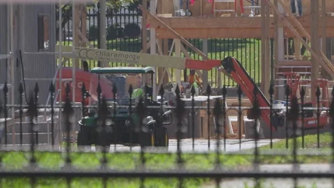 Construction scaffolding behind the security fence at the White House Stock Footage 345299574