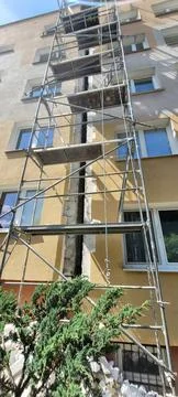 Construction Scaffolding Set Up on Building Facade for Important Renovation Work Stock Photos