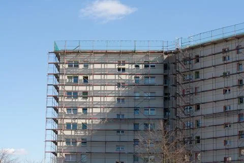 Construction scaffolding on the side of a building Stock Photos