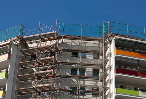 Construction scaffolding on the side of a building Photos