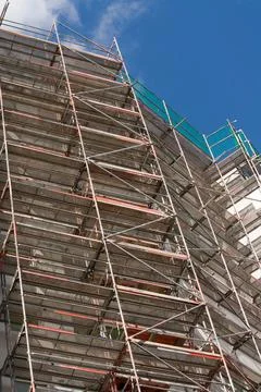 Construction scaffolding on the side of a building Stock Photos