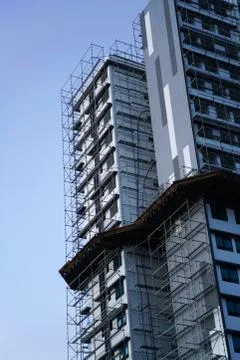 Construction scaffolding stagging on a underprogress apartment Stock Photos