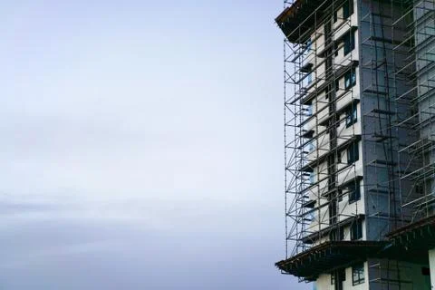 Construction scaffolding stagging on a underprogress apartment Stock Photos