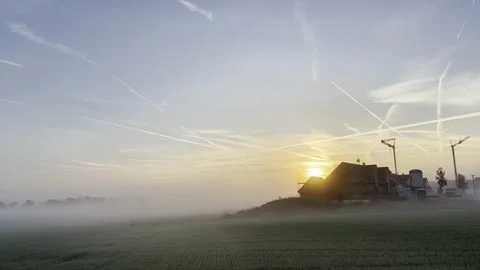 Construction side and misty sunrise: new houses Stock Footage 219313220