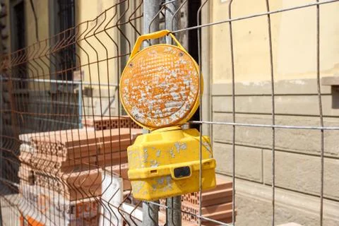 Construction side warning light on the street Stock Photos