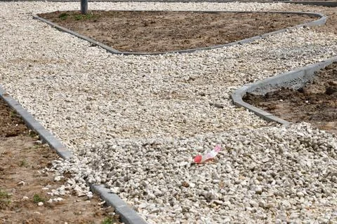 Construction of sidewalks from crushed stone and curbstone, Russia Stock Photos