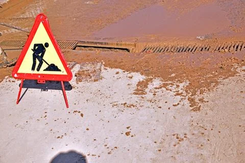Construction sign in a work zone, to remove the effects of flooding Stock Photos