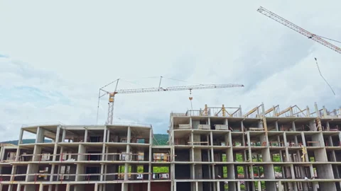 Construction site activity. Building in progress with crane. Urban construction Stock Footage 340140973