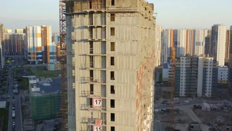 Construction site, aerial view. High cranes works on building site with a houses Stock Footage 132050907