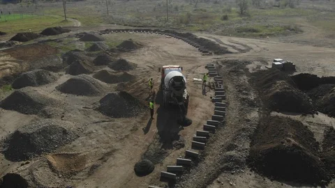 Construction site from the air. Concrete mixer truck from the air. Stock Footage 125536363
