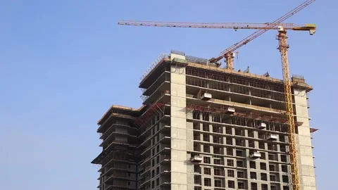 Construction site and construction cranes on a blue sky background. Stock Footage 150417716