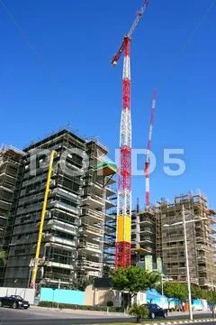 Construction site and crane Stock Photos