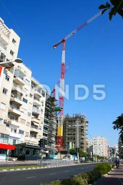 Construction site and crane Stock Photos