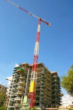 Construction site and crane Stock Photos