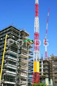 Construction site and crane Stock Photos