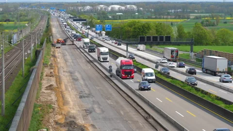 Construction site and dense traffic on German highway Видео 239566776